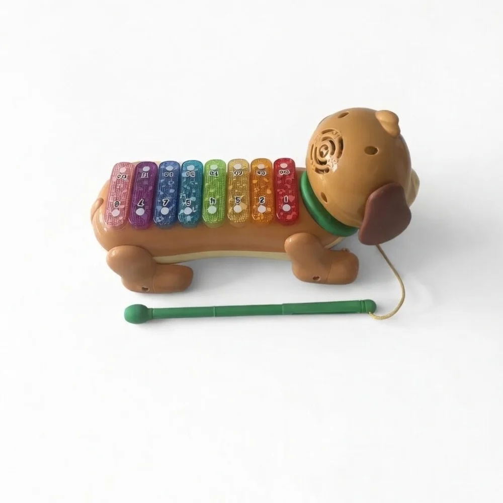 Brown Puppy Pull-Along Musical Dog Toy with Green Mallet